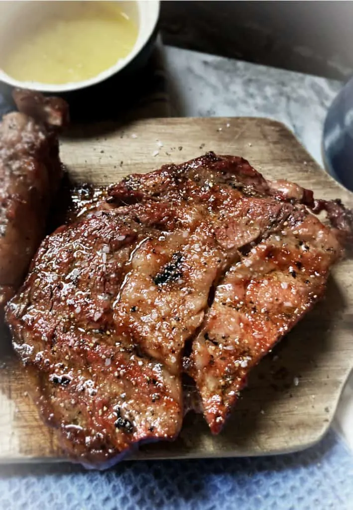smoked ribeye steak on table