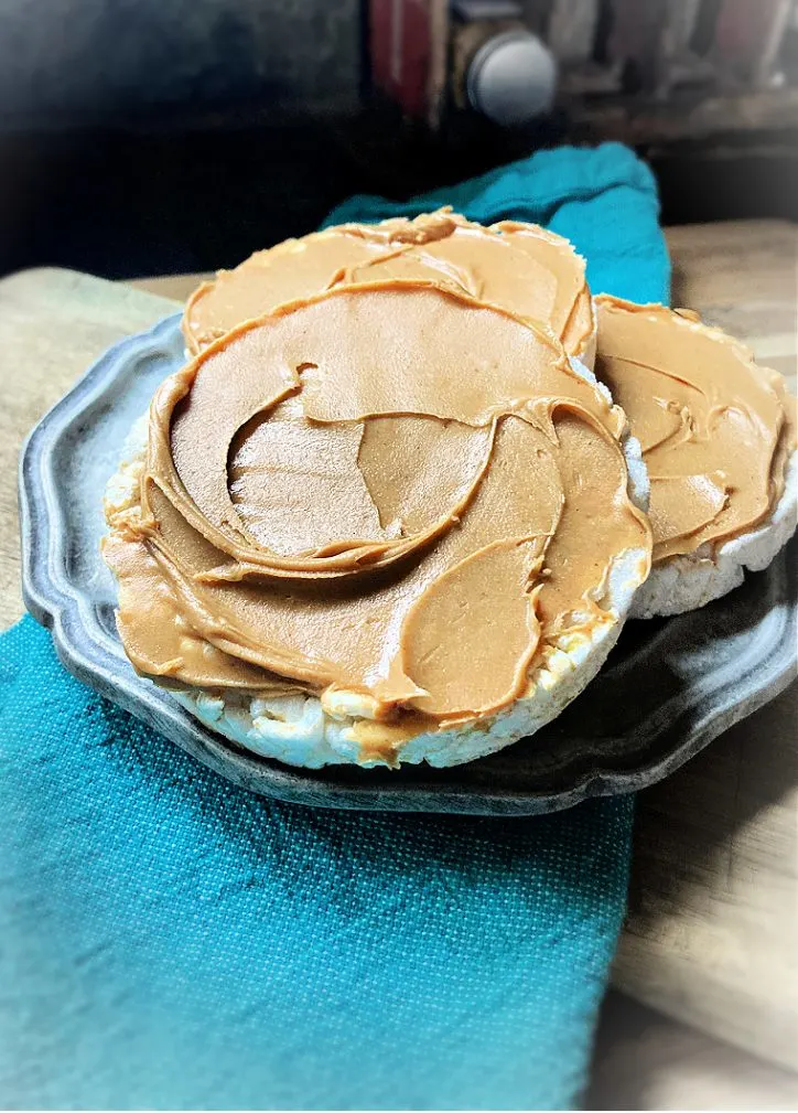 rice cakes with peanut butter on a plate