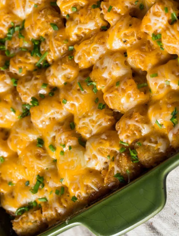 buffalo chicken tater tot casserole in green dish