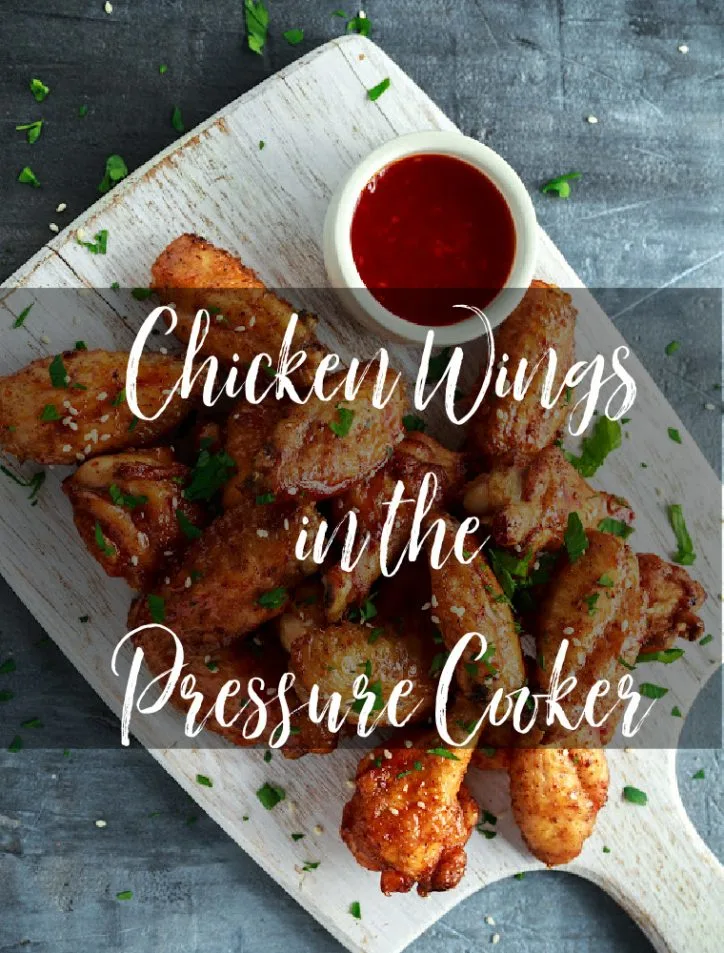 Pressure cooked chicken wings on a cutting board