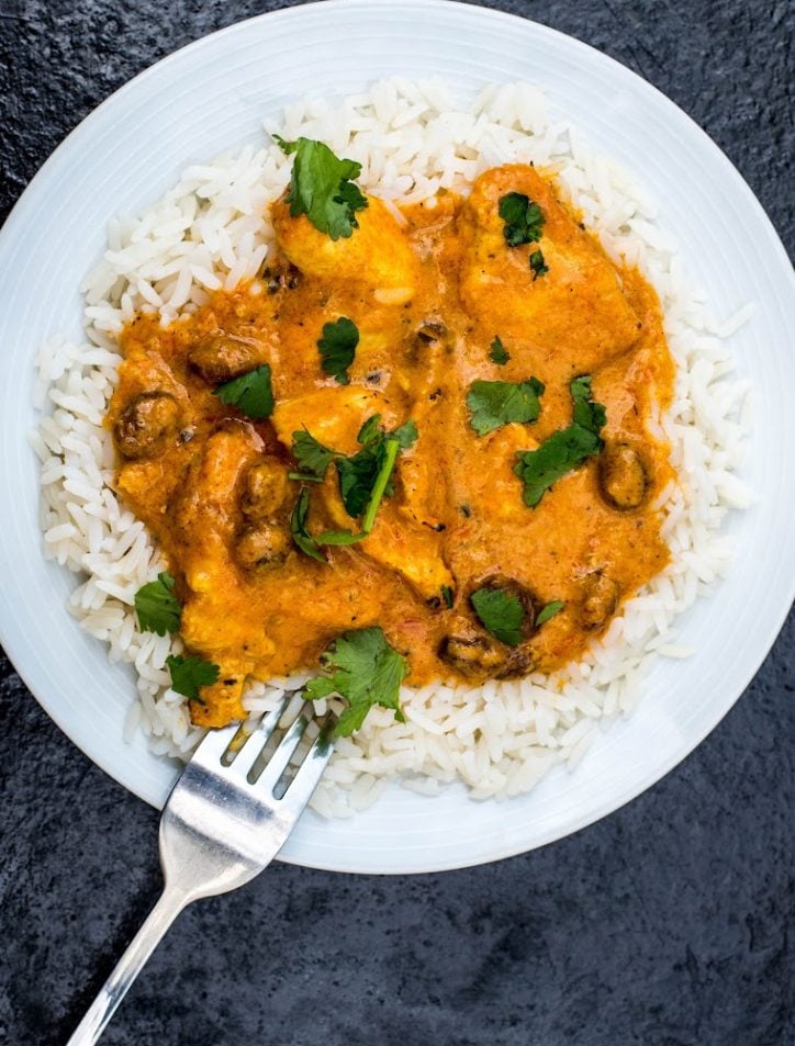 pressure cooker curry chicken on rice on plate