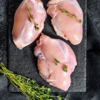 raw chicken with thyme