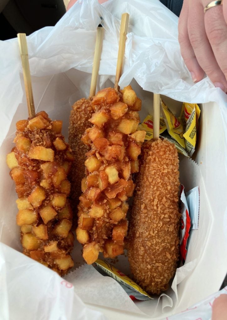 Korean Corn Dogs wrapped in paper 