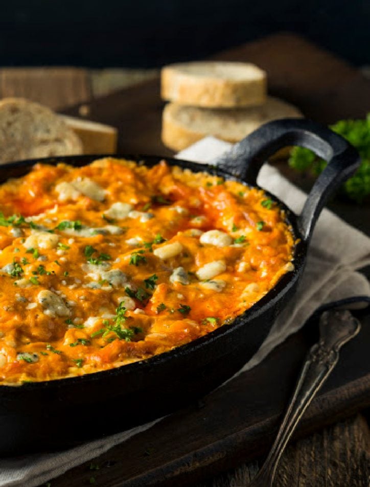 side view of pan of buffalo chicken dip