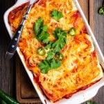 chili relleno casserole with enchilada sauce on table