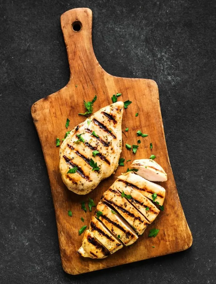 Chicken breasts on a cutting board