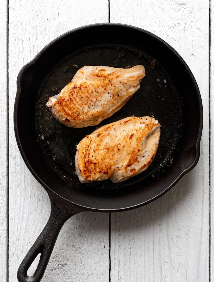 Two Chicken breasts in a pan