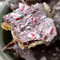 close up of chocolate saltine toffee with peppermints