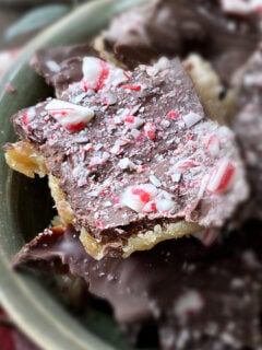 close up of chocolate saltine toffee with peppermints