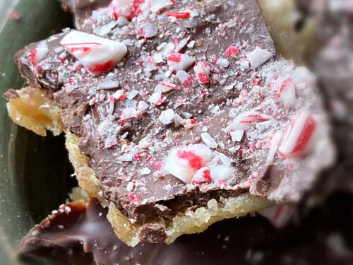 close up of chocolate saltine toffee with peppermints