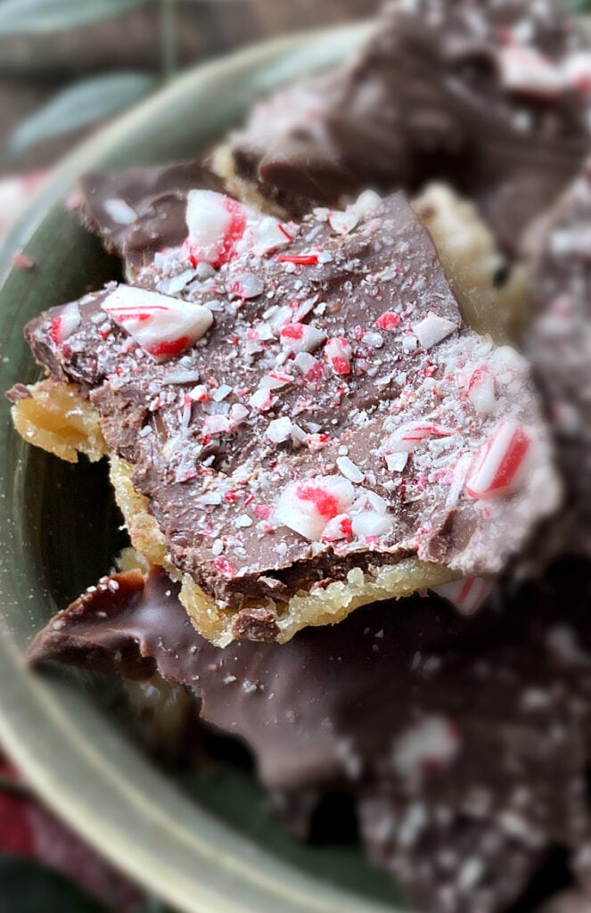 close up of chocolate saltine toffee with peppermints