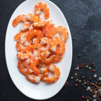 how to cook shrimp with the shell on a plate