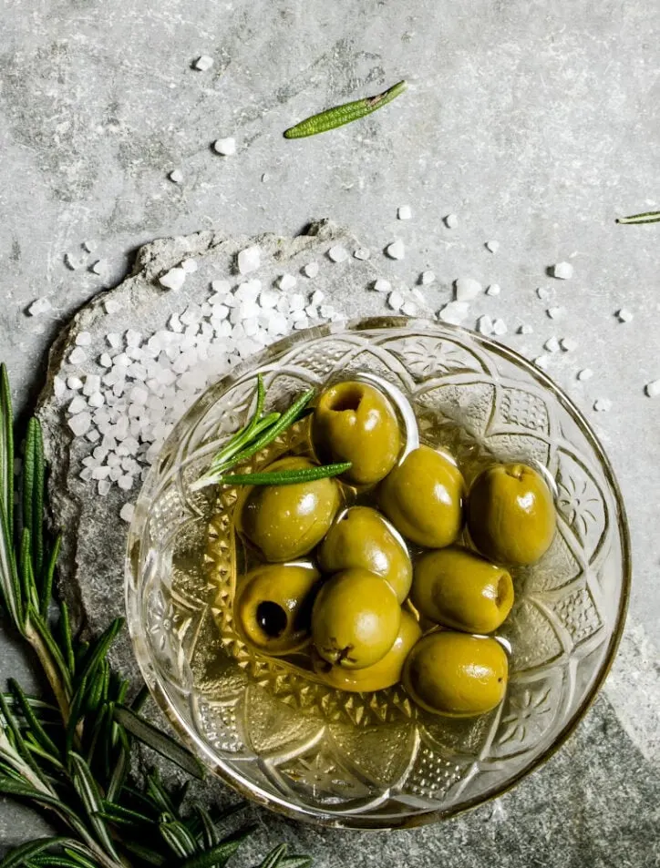 smoked olives recipe in bowl with salt