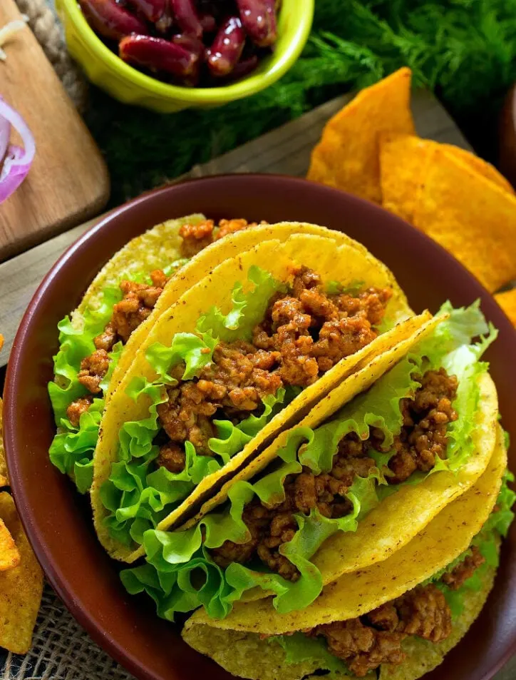 4 tacos on a plate