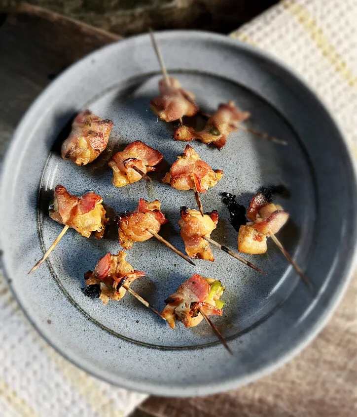 bacon wrapped chicken bites on plate