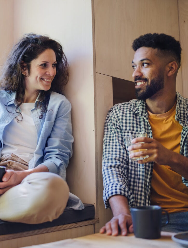 couple making coffee while traveling