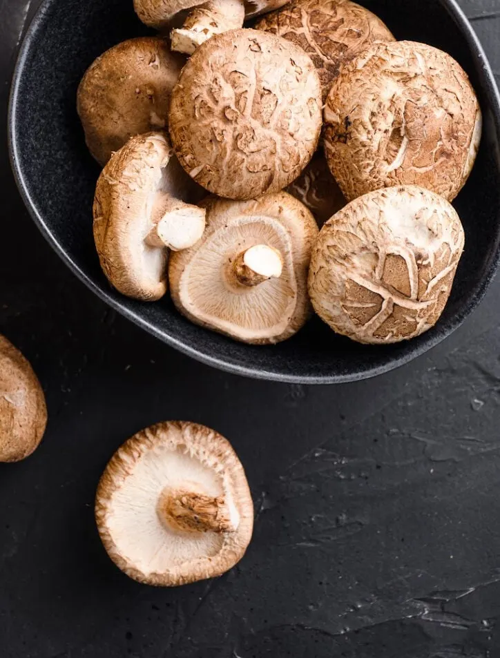 raw mushrooms in a bowl