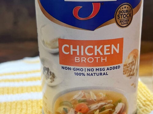 chicken broth in a can on a yellow towel