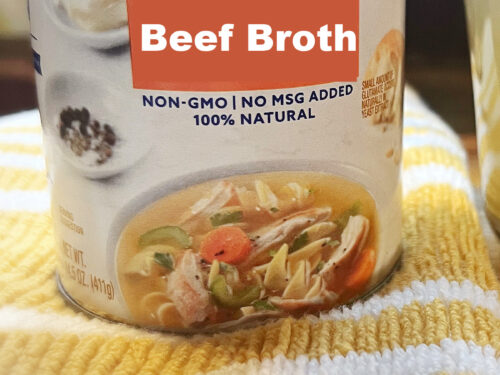 can of canned beef broth on towel