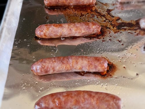 cooked breakfast sausage links on a pan