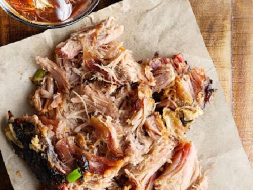 pulled pork serving on brown paper.