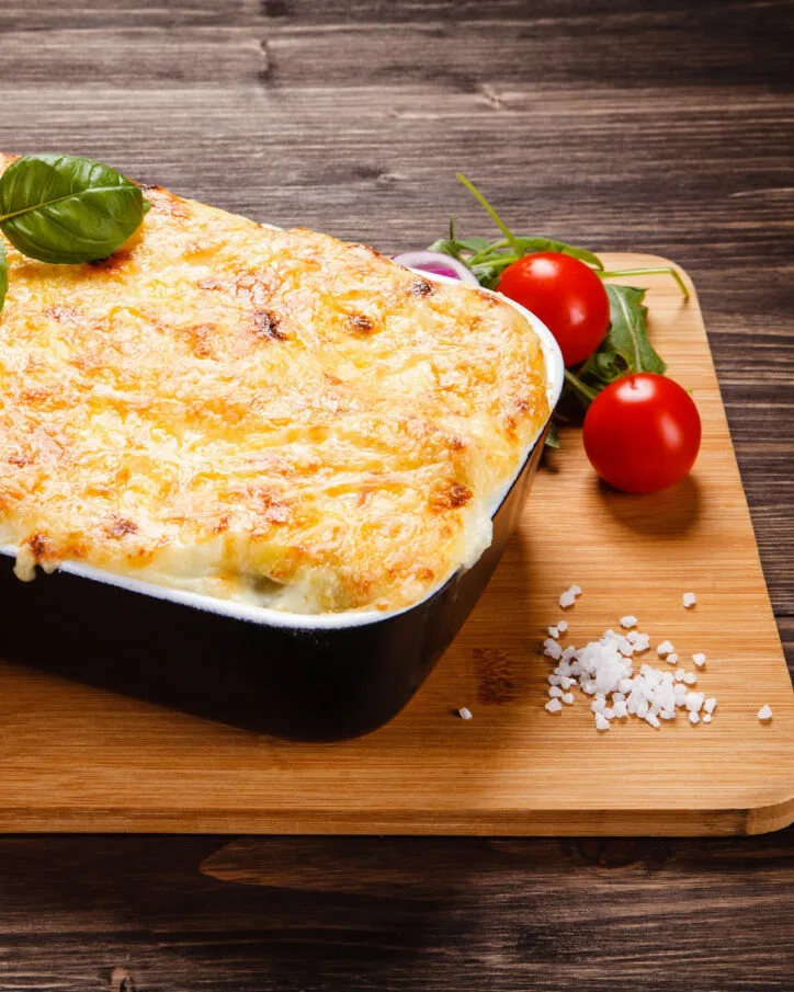 classico lasagna on cutting board.