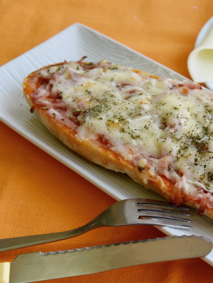 french bread pizza on a plate.