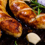 Grilled smoked sausage with garlic.