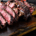 Whiskey Marinade and Jack Sauce Steak on cutting board.