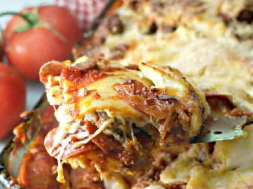 scoop of cowboy lasagna with pepperonis.