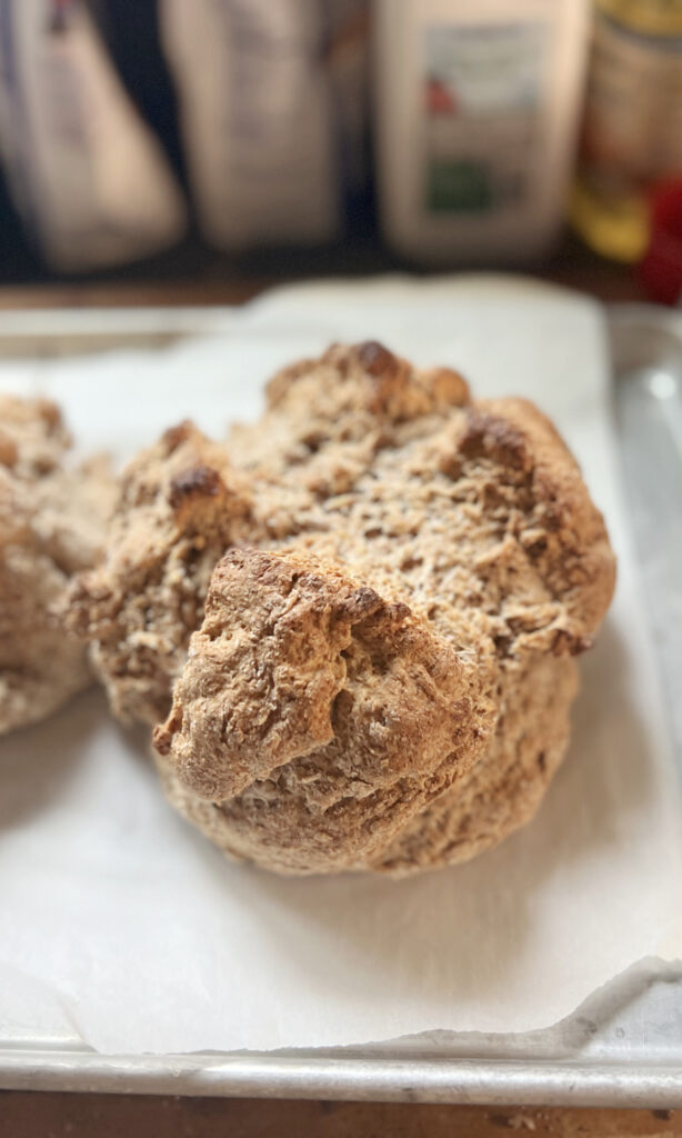 Loaf of Irish Brown Bread on parchment.