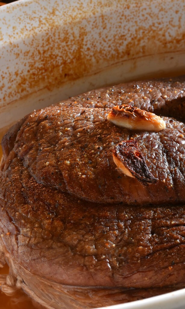 Pot roast in baking dish.