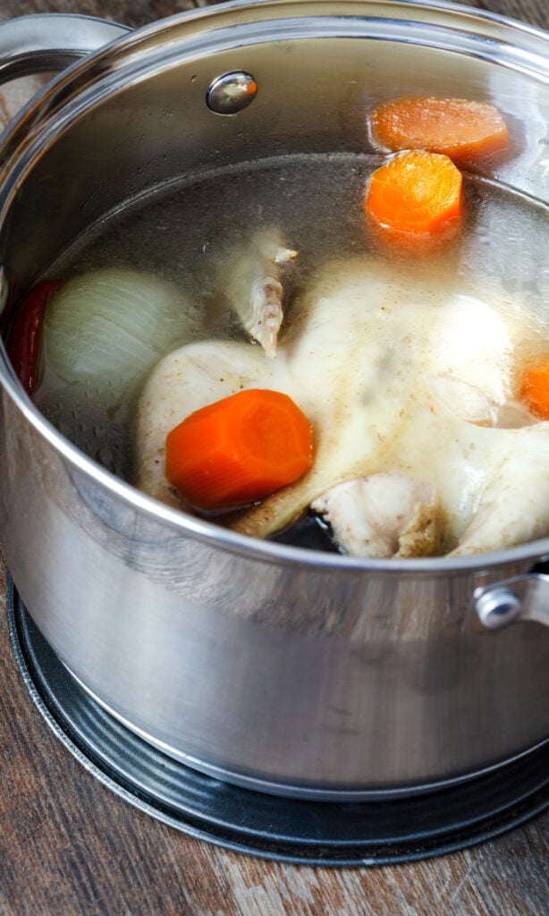 stock pot of chicken stock.