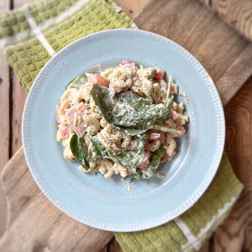 pasta salad on a blue plate